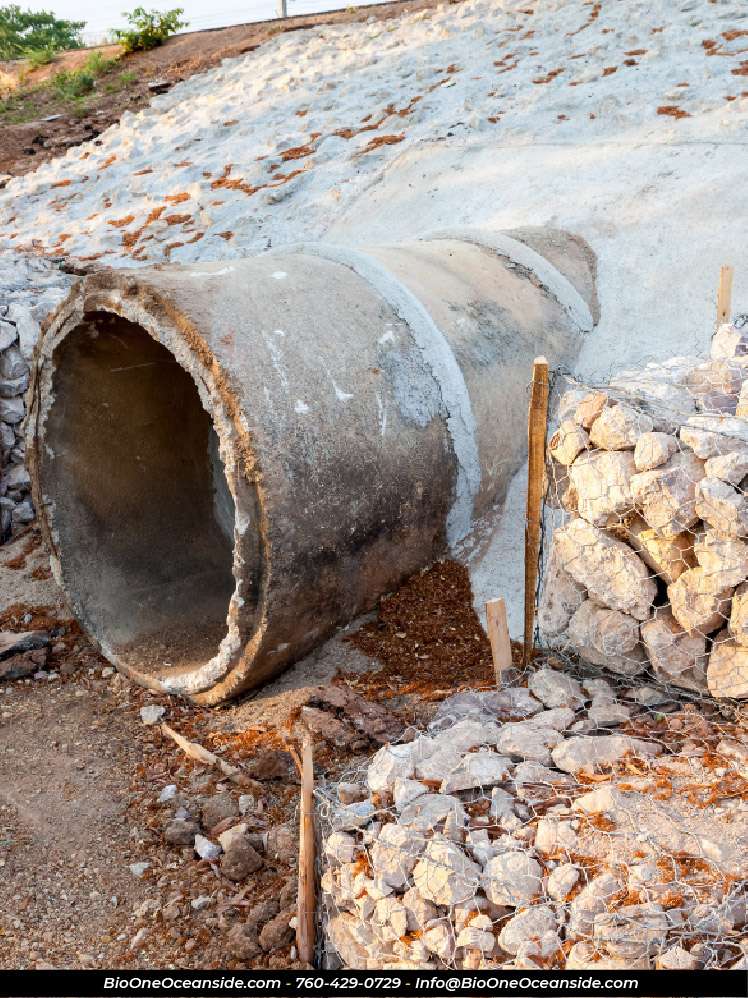Concrete sewer pipes clogged. Photo credit: Bio-One of Oceanside.